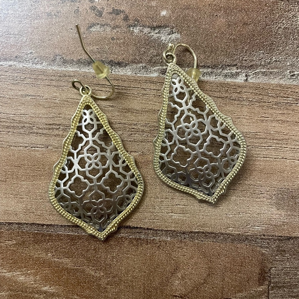 Kendra Scott earrings. Silver interior lined with gold rim